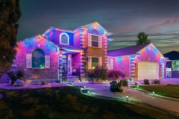 Multicolor RGBW permanent lighting installation on a large residential property