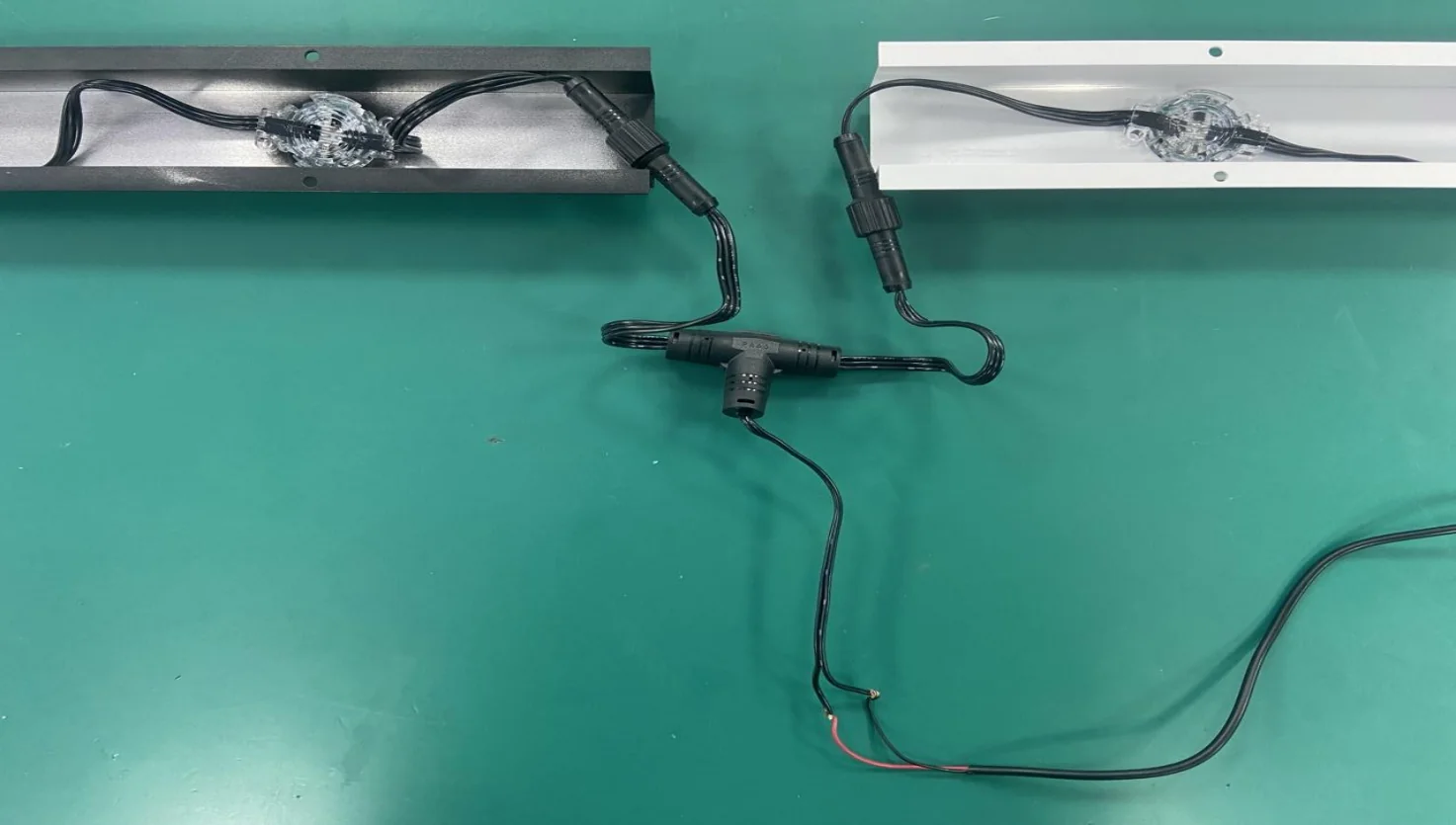 Waterproof T connector joining two RGBW pixel light runs at a power injection point