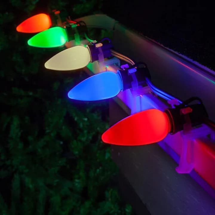 Illuminated C9 opaque LED bulbs installed in commercial E17 sockets